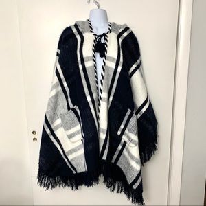 100% wool handcrafted poncho. Bogo!